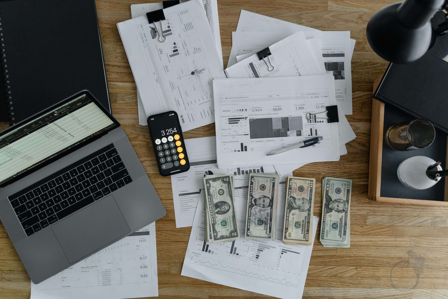 Property management franchise vs going independent — independent property manager overwhelmed by paperwork at a desk